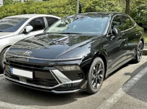 A black Hyundai Sonata, front view