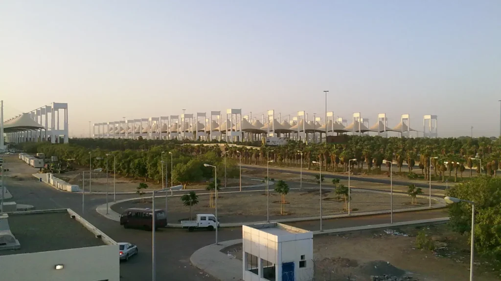 White tent roofs of the Hajj Terminal at King Abdulaziz International Airport, Jeddah, seen from a distance