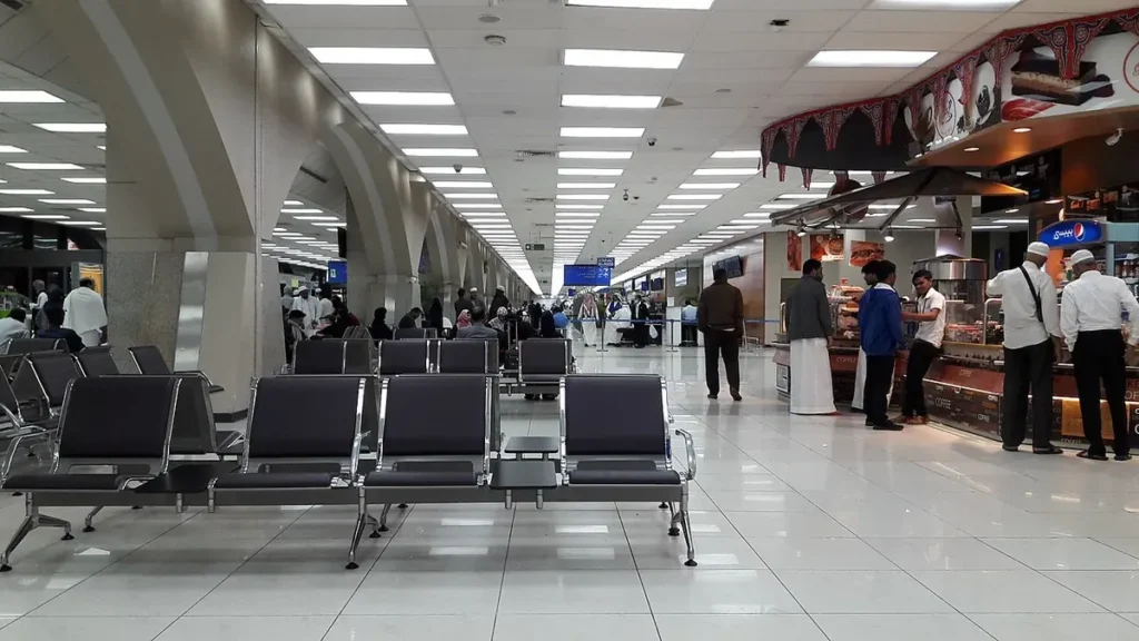 Waiting seats and a cafe counter inside the North Terminal of King Abdulaziz International Airport, Jeddah
