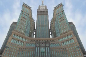 Abraj Al Bait towers and the Makkah Clock Royal Tower from street level, low angle