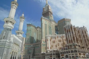 Masjid al-Haram minarets beside the Abraj Al Bait clock tower and hotel blocks