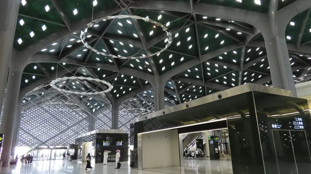 Main hall of Madinah station on the Haramain High Speed Railway, with its lattice roof and ring lights