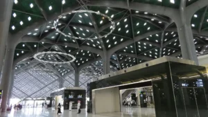 Main hall of Madinah station on the Haramain High Speed Railway, with its lattice roof and ring lights