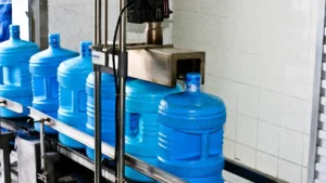 Zamzam water containers on a filling line