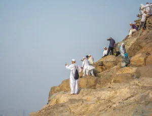Visitors on the rocks of the final climb to the Cave of Hira on Jabal al-Nour