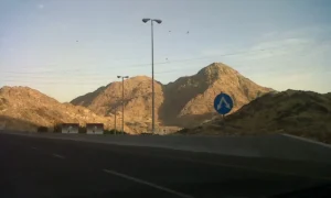 The peak of Jabal Thawr seen from the main road in Makkah at sunset